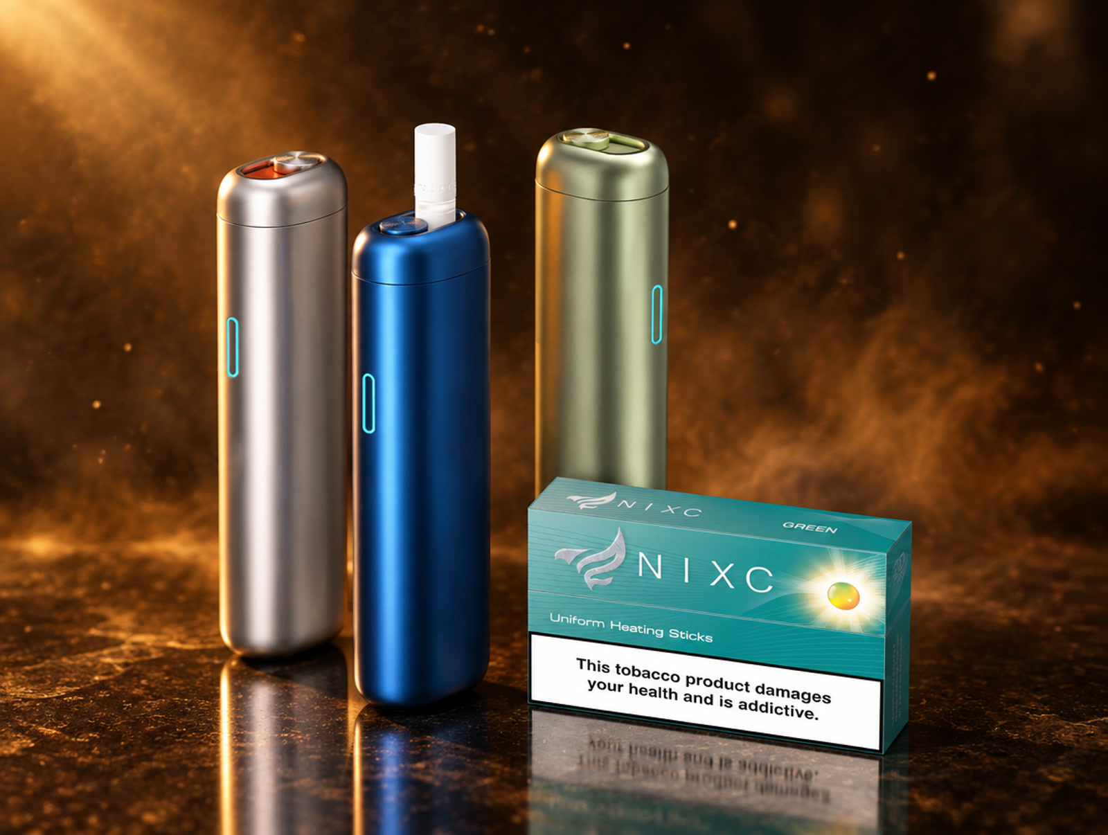 Three induction heating devices beside a NIXC Green pack on polished bronze stone
